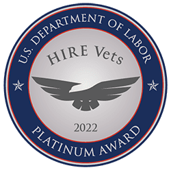 Platinum HIRE Vets Medallion Award badge presented to Lazarus Alliance by the U.S. Secretary of Labor for excellence in veteran recruitment and employment.