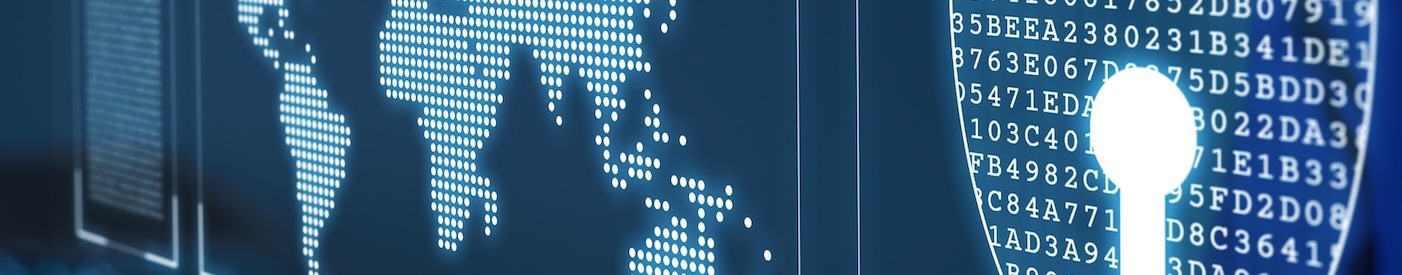 abstract glowing symbols of a shield and map above a laptop.